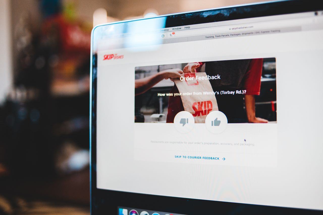 Website design with web banner of order feedback on online shopping center on computer screen